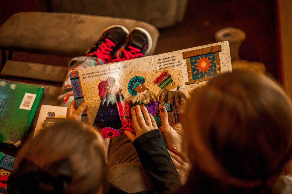 Children reading bedtime stories